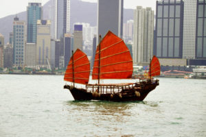 Sampan with red sails at Hong Kong Harbor, Hong Kong, China